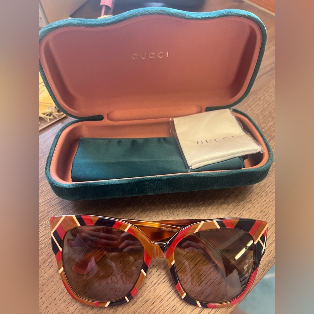 Gucci sunglasses never worn